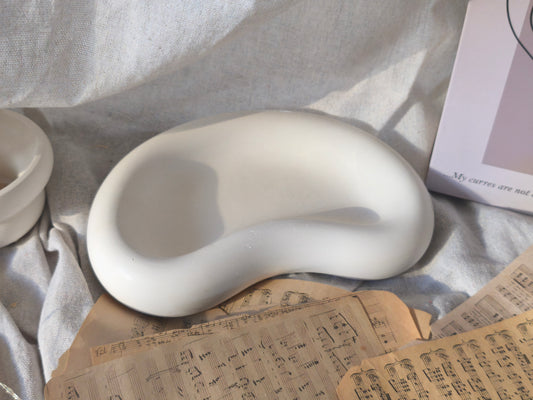 Vide-poches incurvé